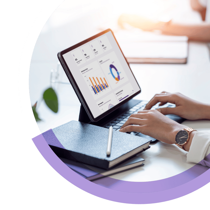Person using a tablet with sustainability analytics dashboard, charts and product data on screen, symbolizing automated life cycle assessment and environmental impact analysis.